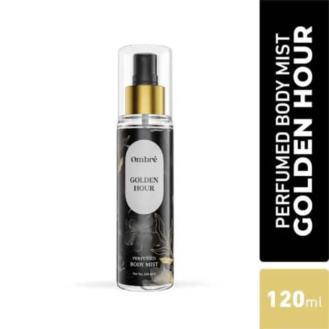 Ombre Golden Hour perfumed body mist in a gradient glass bottle with a sleek gold cap.