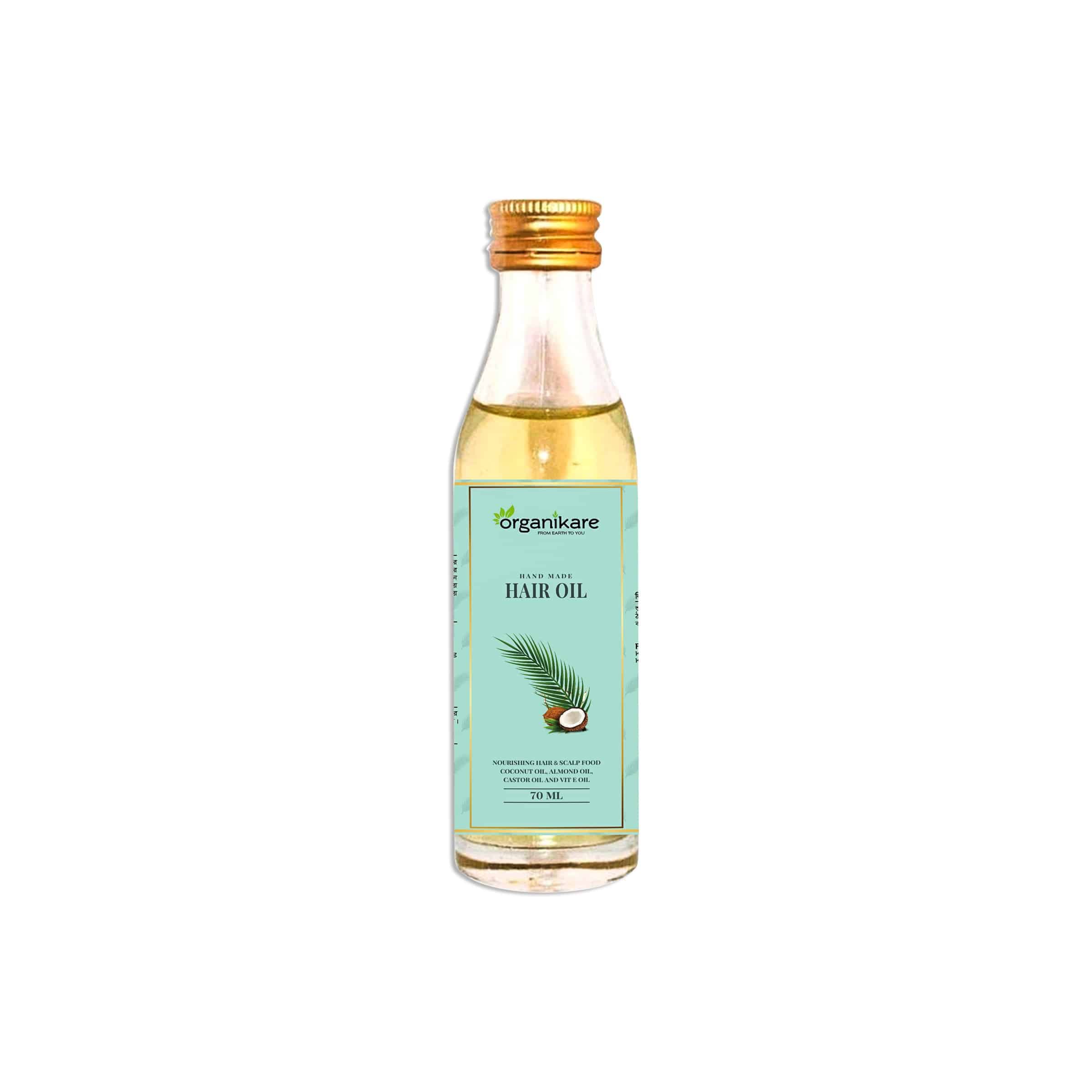 Organikare Handmade Hair Oil in a clear glass dropper bottle with rich amber liquid. - thumbnail