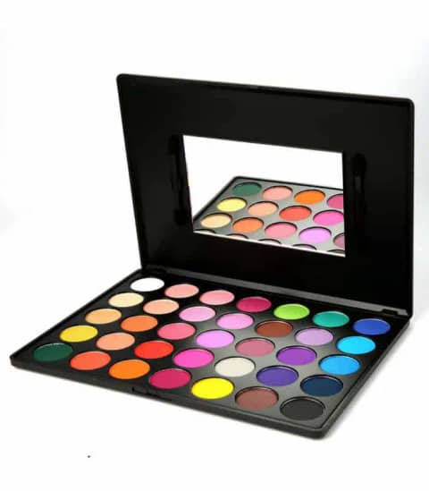 OTZ 35 Colours Eyeshadow palette in a sleek black compact case, viewed from an angle.