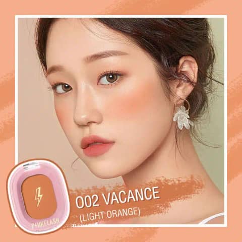 Pink Flash Chic In Cheek Pigmented Blush 002, upright in clear square packaging, showing peachy-pink shade.
