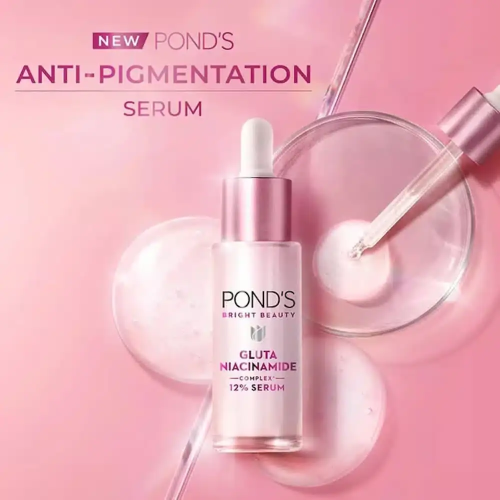 Ponds 12% Gluta-Niacinamide serum bottle angled view, showcasing white cap and label. - thumbnail
