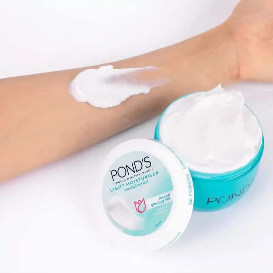 Open Ponds Light Moisturiser 50ml jar showing creamy white product, pink cap beside it. - thumbnail