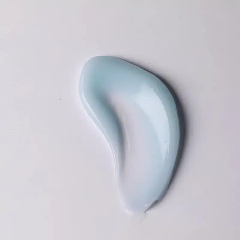 Ponds Super Light Gel open blue jar showing light gel texture inside with a finger. - thumbnail