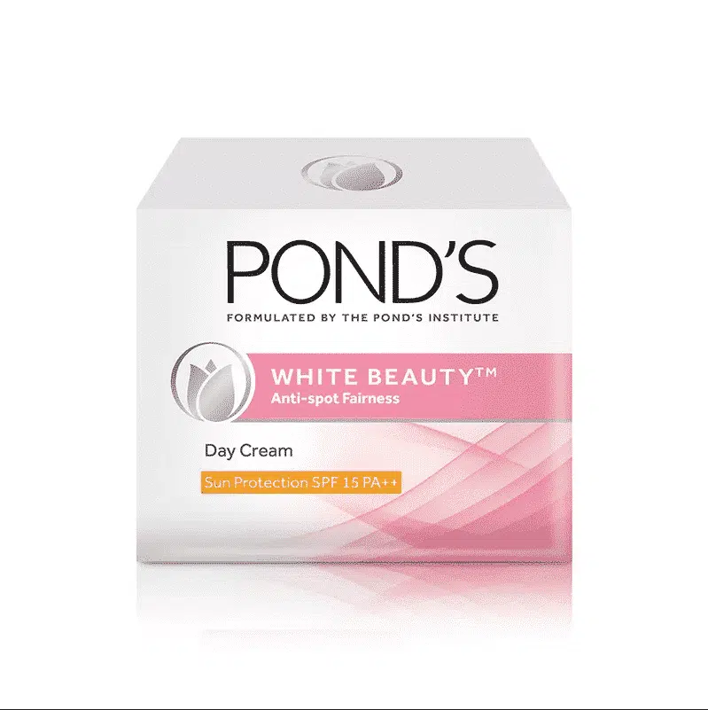 Ponds White Beauty fairness cream jar with pink lid, prominent branding, front view.