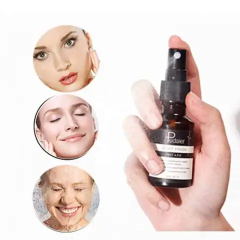 Pudaier Makeup Setting Spray bottle, clear plastic with pink liquid and golden pump, front view on white background.