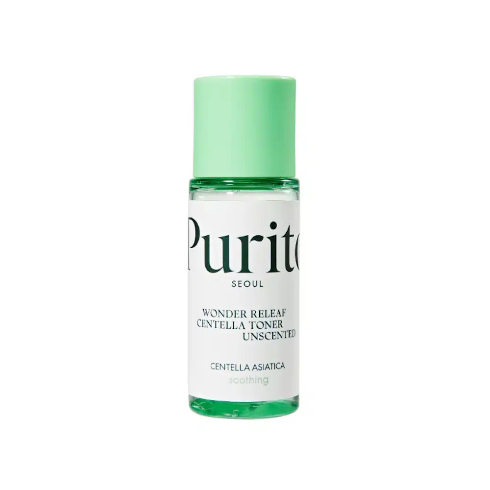 Purito Wonder Releaf Centella Toner 30ml clear bottle, green label, with fresh Centella leaves on white. - thumbnail
