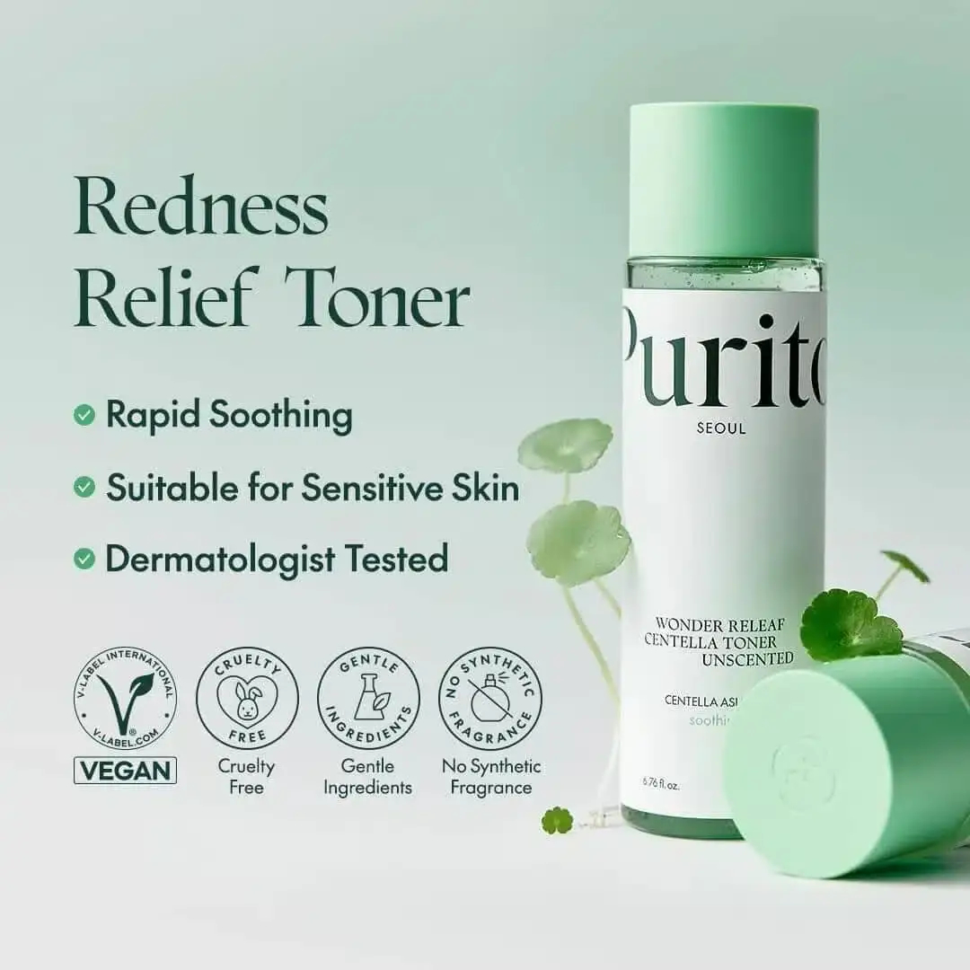 Purito Centella Toner bottle open, lying horizontally, showing amber liquid with fresh green leaves. - thumbnail