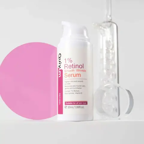 Quiyum 1% Retinol Serum 30ml in amber glass bottle with dropper, front view.