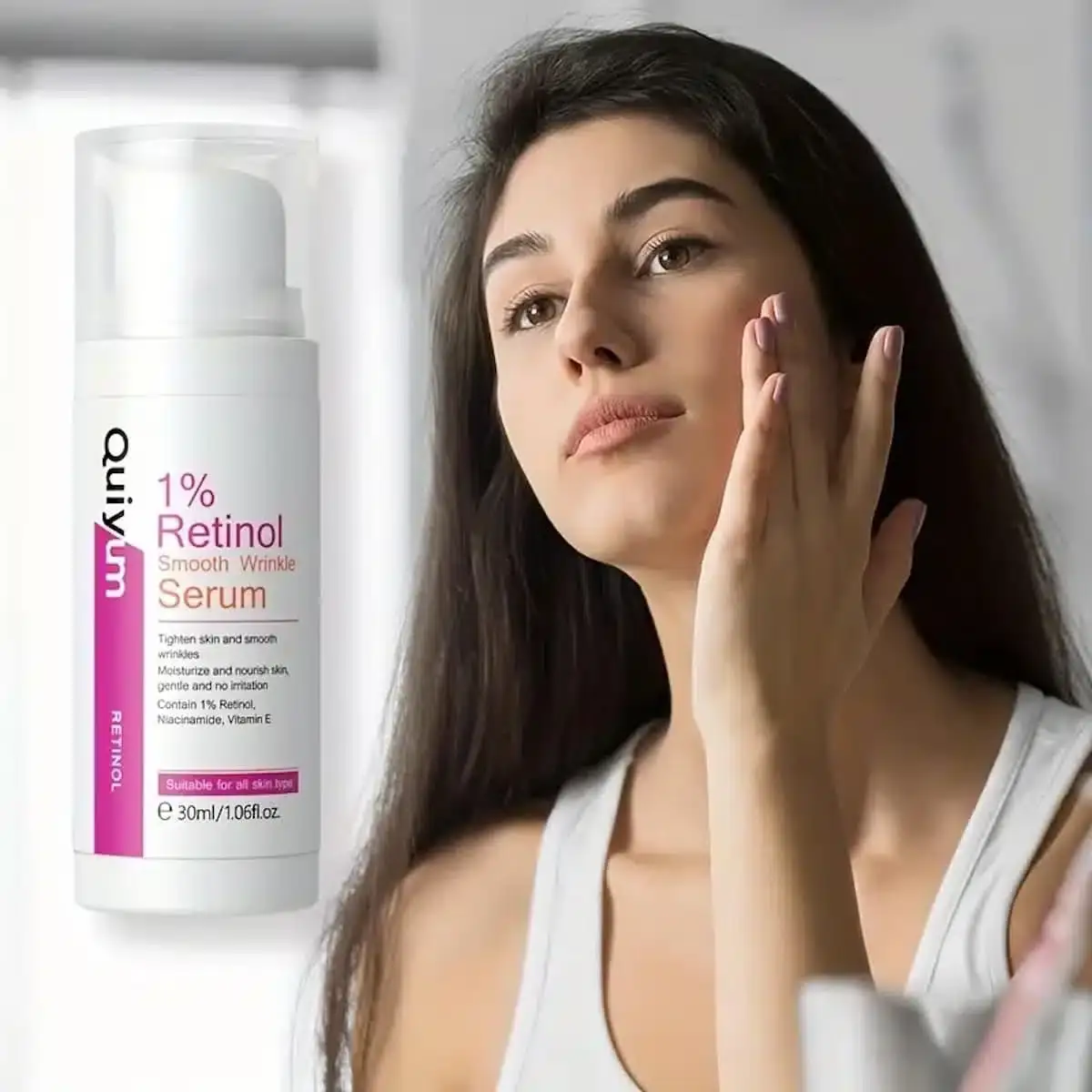 Quiyum 1% Retinol Serum drop on fingertip, showcasing serum texture and application. - thumbnail