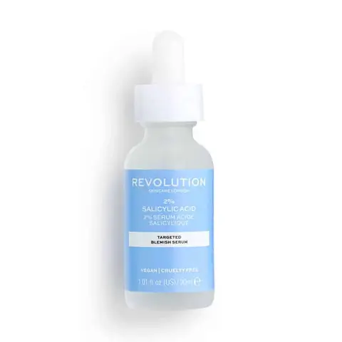 Revolution 2% Salicylic Acid BHA serum in a clear glass bottle with a white dropper, standing upright.