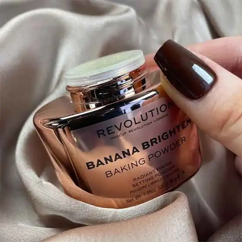 Top view of open Revolution Banana Loose Powder, sifter mesh, and separate yellow lid. - thumbnail