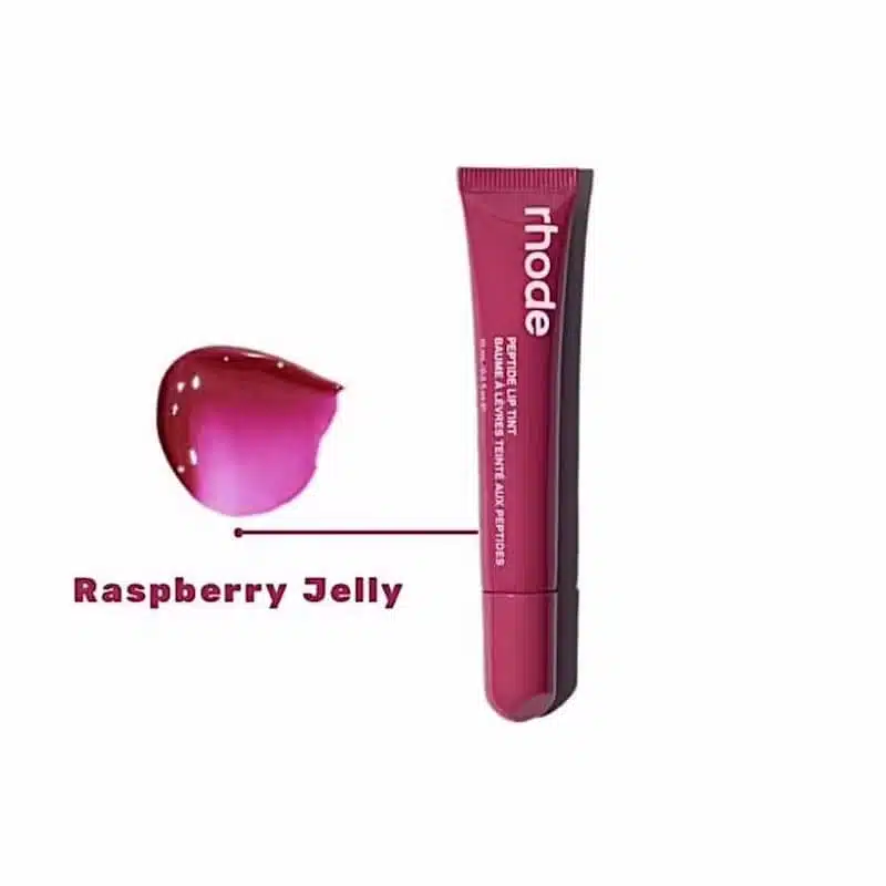 Rhode Peptide Lip Tint in Raspberry Jelly, upright, showcasing its sleek tube and glossy finish. - thumbnail