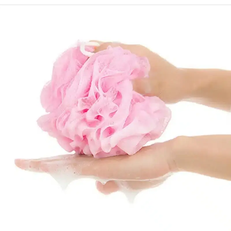 Ruxnt bath ball loofah close-up, showing soft layered mixed pink, blue, white mesh texture. - thumbnail
