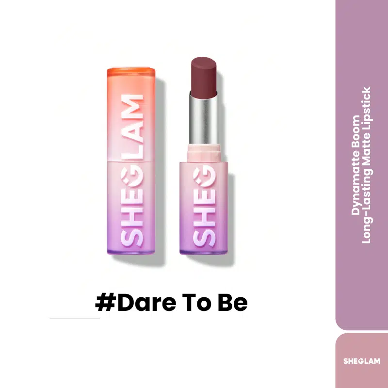 Sheglam Dynamatte Boom long lasting matte lipstick, Dare To Be shade, sleek black and gold packaging, angled view.