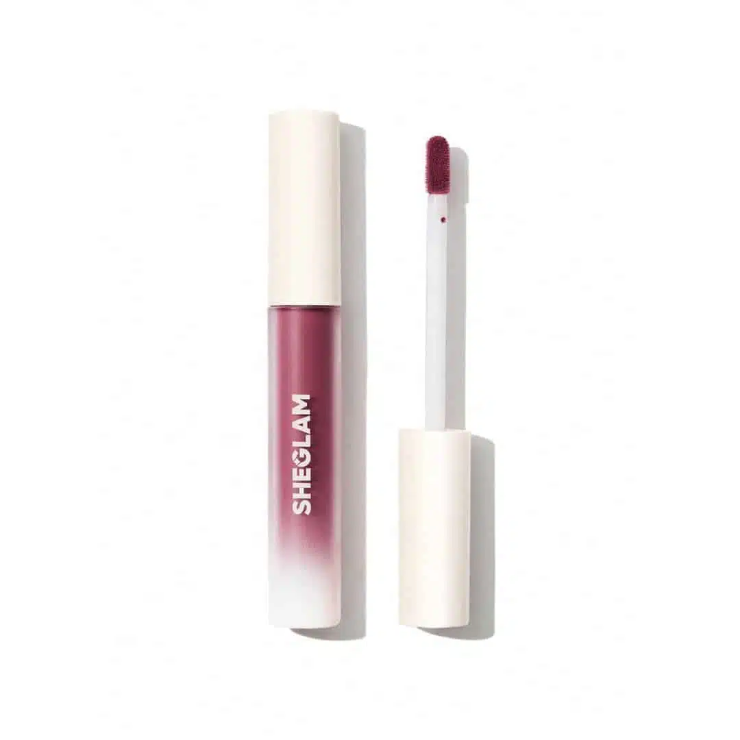 Sleek Sheglam Matte Liquid Lipstick in Vineyard stands upright, showcasing its clear tube and black cap. - thumbnail