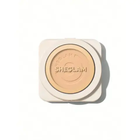 Sheglam Skin Focus High Coverage Powder Foundation compact, open, revealing fair shade and sponge applicator.