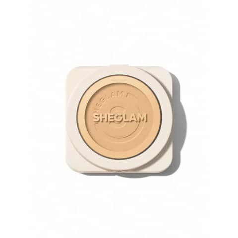 Sheglam Skin Focus Honey powder foundation in a sleek, closed silver compact for coverage.