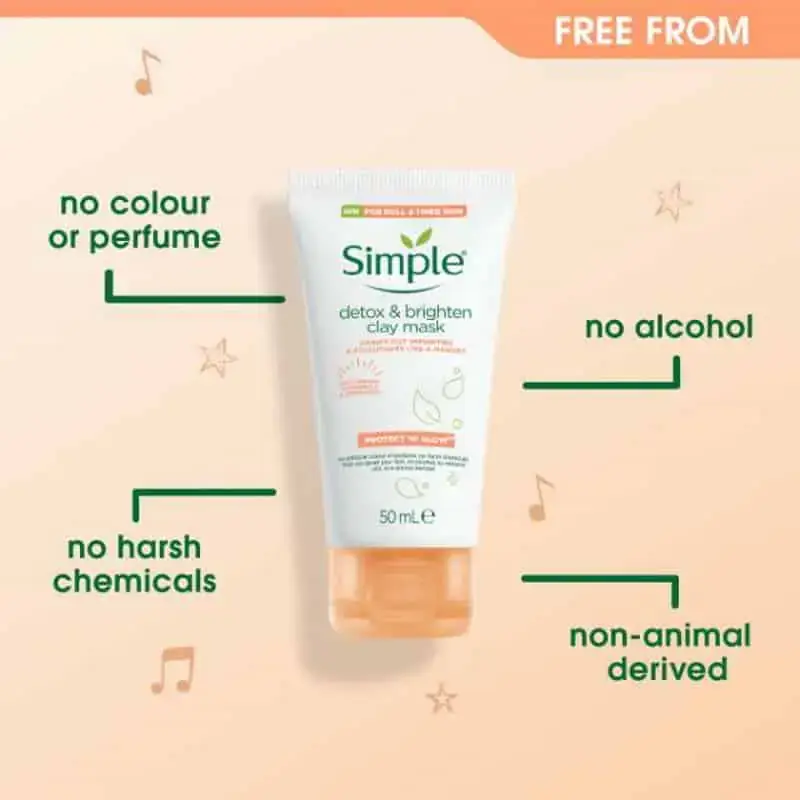 Creamy white texture of Simple Detox and Brighten Clay Mask applied on a fingertip. - thumbnail