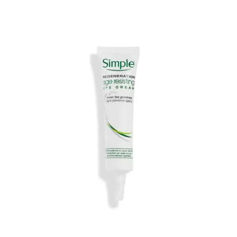 Close-up of Simple Age Resisting Eye Cream's green flip-top cap and the top of the white tube. - thumbnail