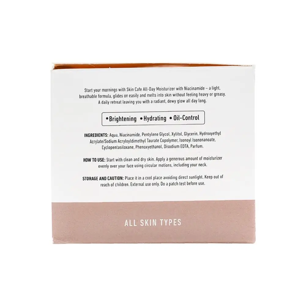 Hand applying Skin Cafe Niacinamide Moisturiser cream onto skin, showing smooth application. - thumbnail