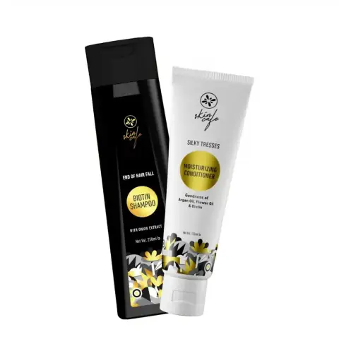 Skin Cafe Hair Fall Biotin Shampoo and Conditioner set, white bottles, green labels, BOGO offer.