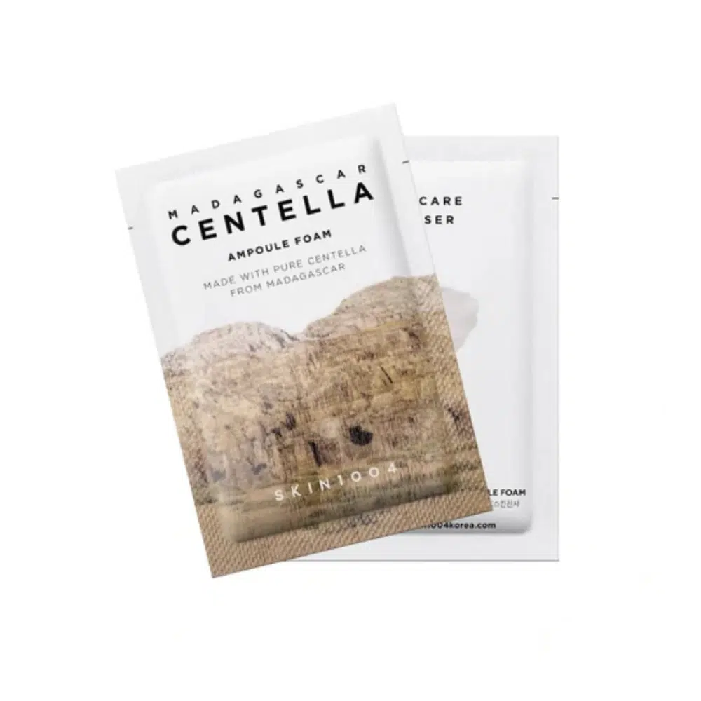 SKIN1004 Madagascar Centella Ampoule Foam 1.5ml single-use sachet, white and green packaging.