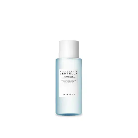 SKIN1004 Madagascar Centella Hyalu-CICA Brightening Toner 30ml, clear bottle, white cap, upright on white.