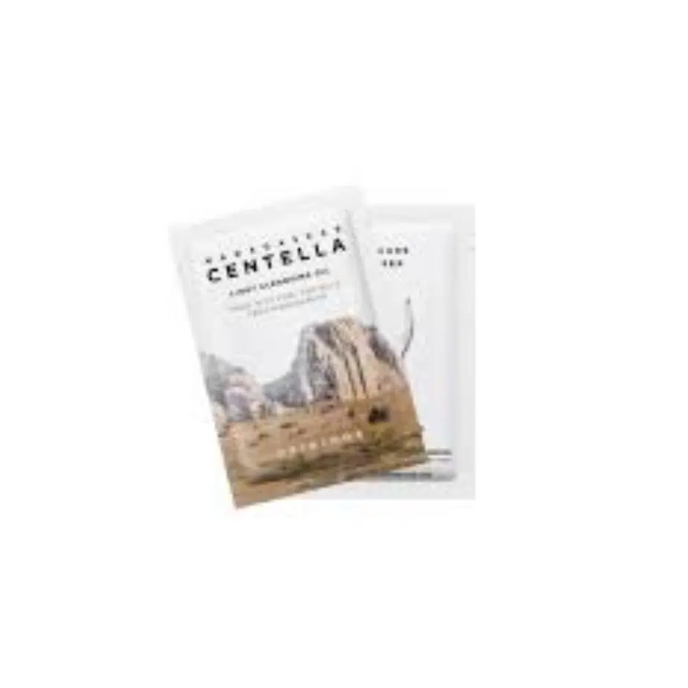 Skin1004 Madagascar Centella Light Cleansing Oil 1.5ml sachet, white with green text, front view.