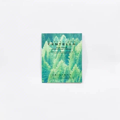 Front view of Skin1004 Madagascar Centella Tea-Trica Purifying Toner 1.5ml sachet, white with green leaf design.