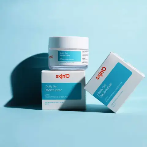 SkinO Daily Gel Moisturizer 70ml tube with niacinamide and green tea, front-facing on green background.