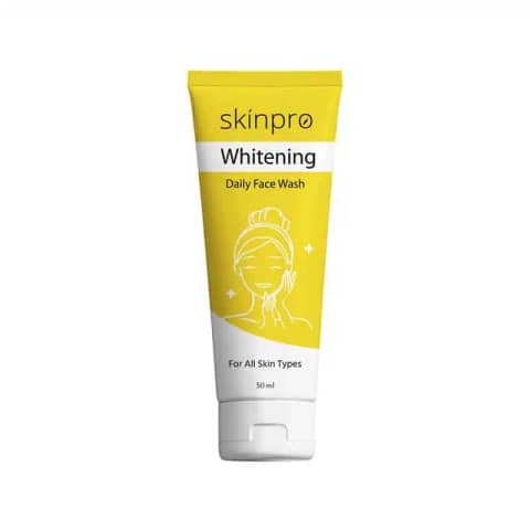 Skinpro Whitening Daily Face Wash 50ml in white tube, blue flip cap visible on plain background.