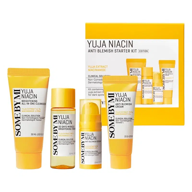 SOME BY MI Yuja Anti-Blemish Starter Kit with four yellow-accented mini products and pouch displayed.
