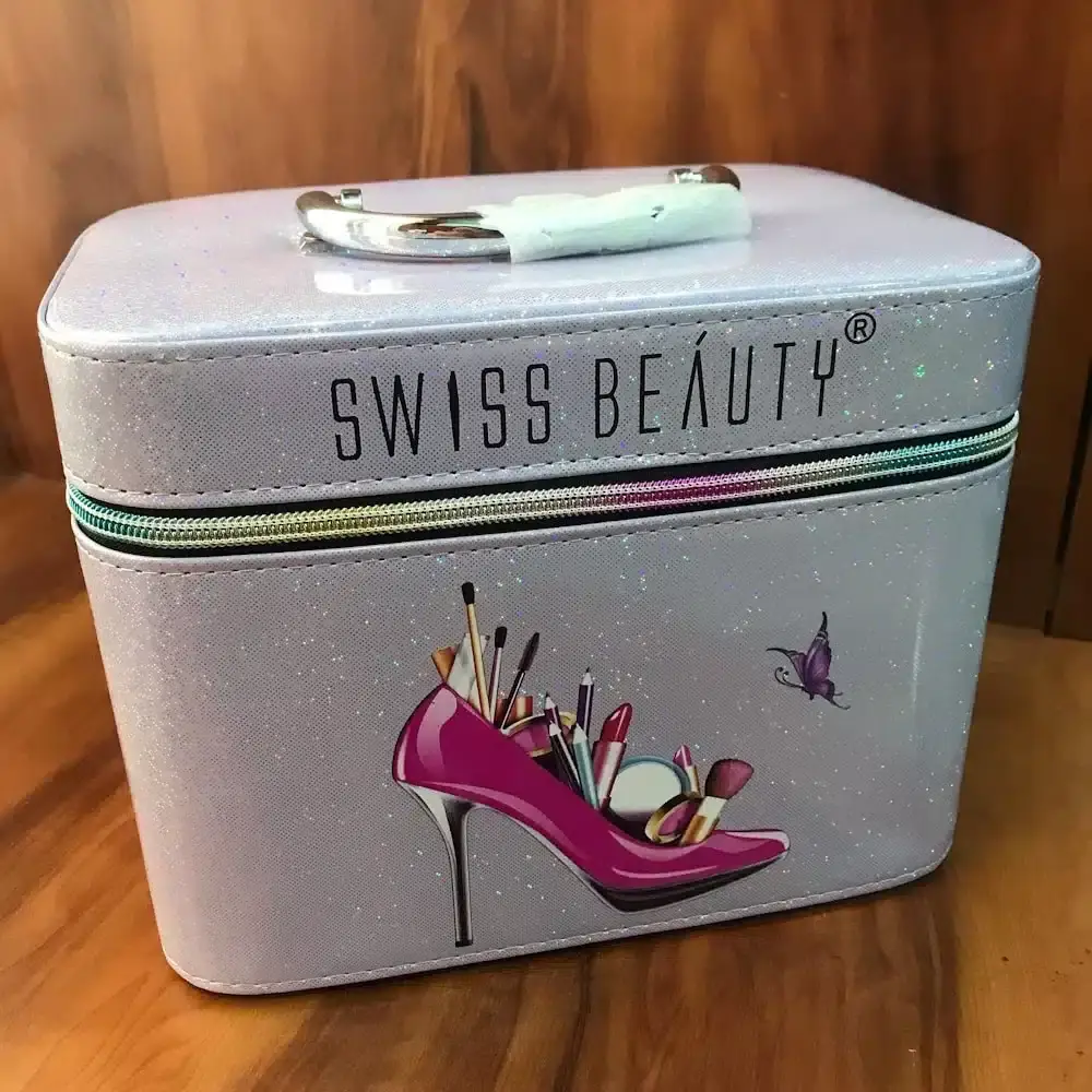Open Swiss Beauty vanity box revealing spacious interior compartments, mirror, and expandable trays. - thumbnail