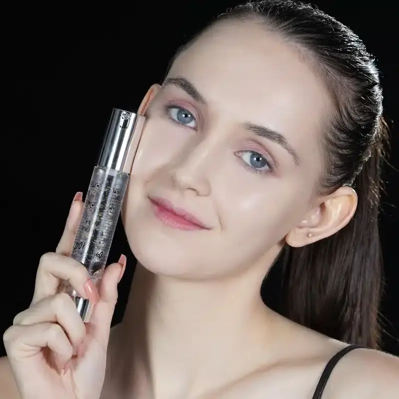 Close-up of Swiss Beauty Pearl Primer bottle, revealing shimmery pearlescent liquid and pump top. - thumbnail