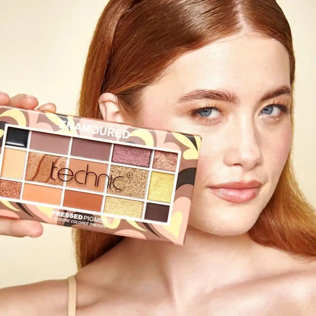 Technic Enamoured eyeshadow palette open, displaying 15 vibrant pressed pigment shades inside. - thumbnail