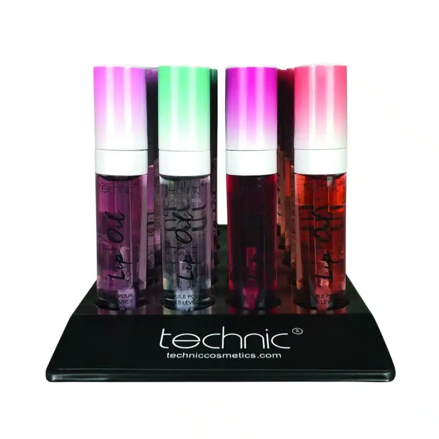 Close-up of the Technic Cherry Lip Oil's soft applicator, ready for smooth lip application. - thumbnail