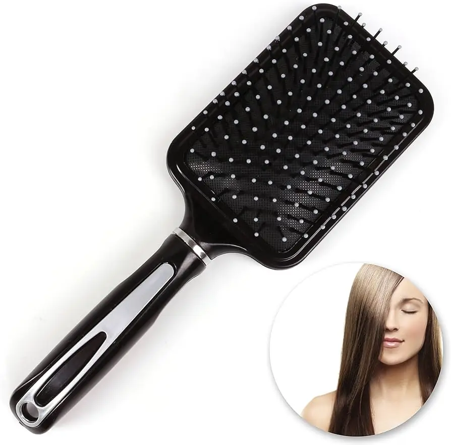 Two Technic paddle hairbrushes, magenta and blue, featuring black handles and mixed bristles. - thumbnail