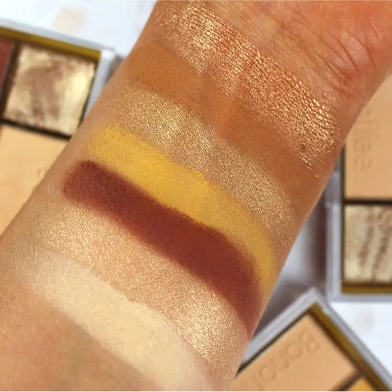 Close-up of Technic Banoffee pressed pigments, highlighting rich matte and shimmery brown shades. - thumbnail