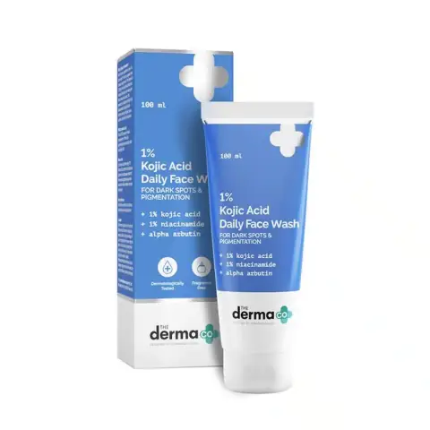 The Derma CO 1% Kojic Acid Daily Face Wash, 100ml white and orange flip-top tube.