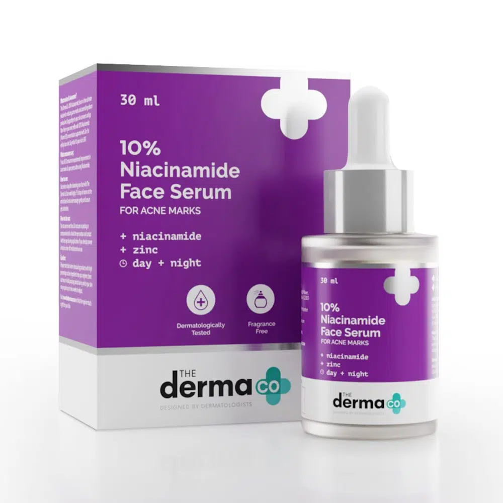 The Dermaco 10% Niacinamide Serum 30ml, clear glass bottle with white dropper cap, standing.