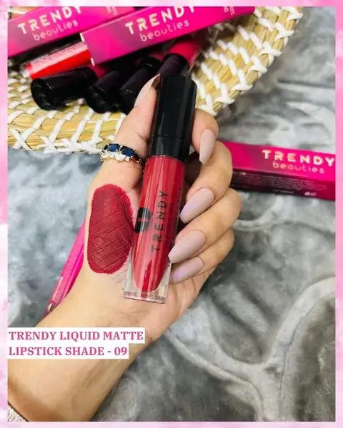 Trendy Beauties Liquid Matte Lipstick 09 in black tube, deep maroon shade visible, applicator extended.