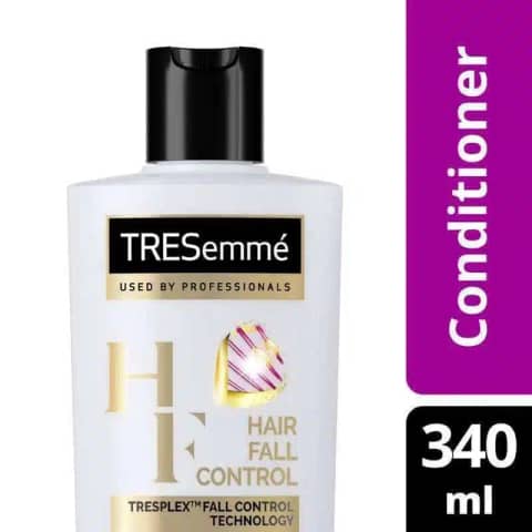 Tresemme Hair Fall Control Conditioner 340ml bottle, black packaging, pump dispenser, angled on white.