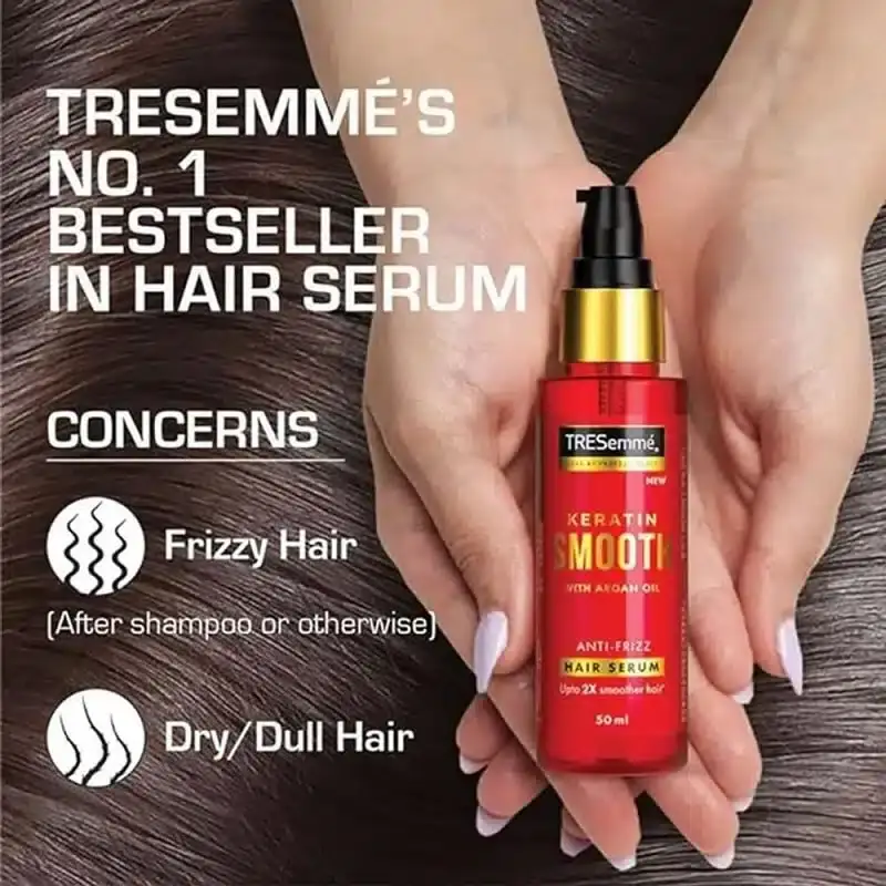 Close-up of Tresemme Keratin Smooth hair serum label highlighting anti-frizz benefits. - thumbnail