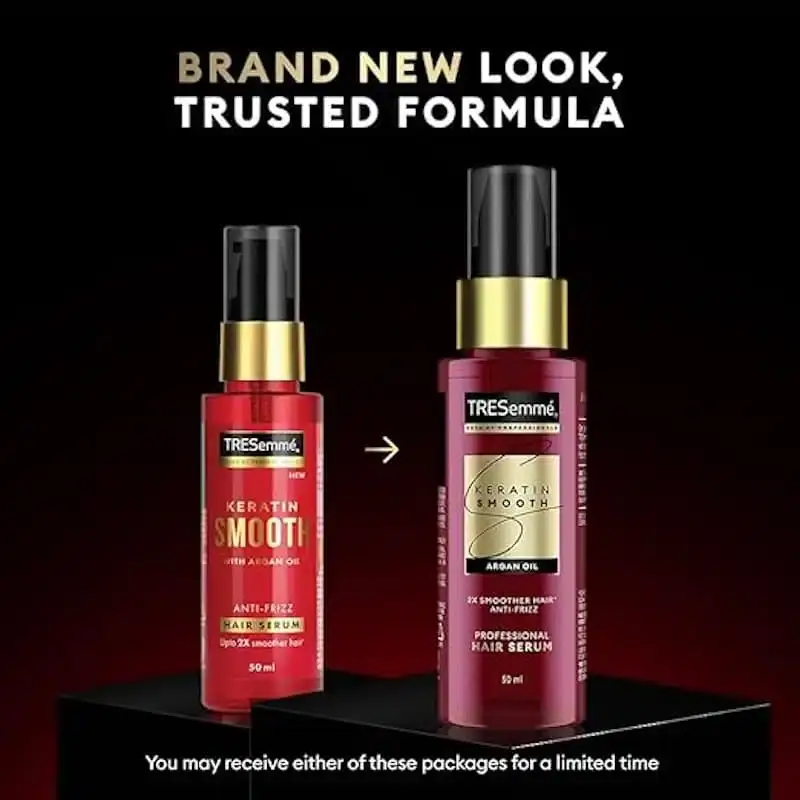 Hand applying Tresemme Keratin Smooth anti-frizz hair serum directly to dry hair. - thumbnail