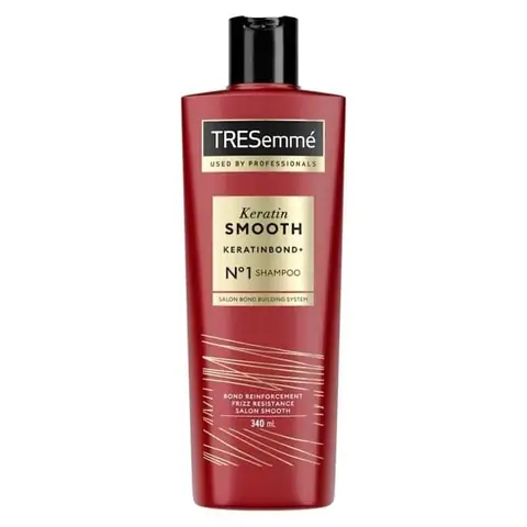 Tresemme Keratin Smooth Shampoo 340ml black bottle, gold pump, displayed clearly from front.