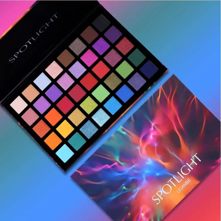 UCANBE Spotlight Eyeshadow Palette swatches on skin, demonstrating vibrant colors and smooth pigmentation. - thumbnail