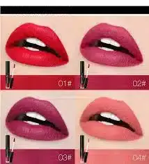 Model applying UCANBE Velvet liquid matte lipstick in a vibrant red shade to her lips. - thumbnail