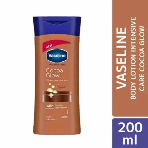 Vaseline Intensive Care Cocoa Glow lotion, 200ml brown bottle with golden pump, angled right.
