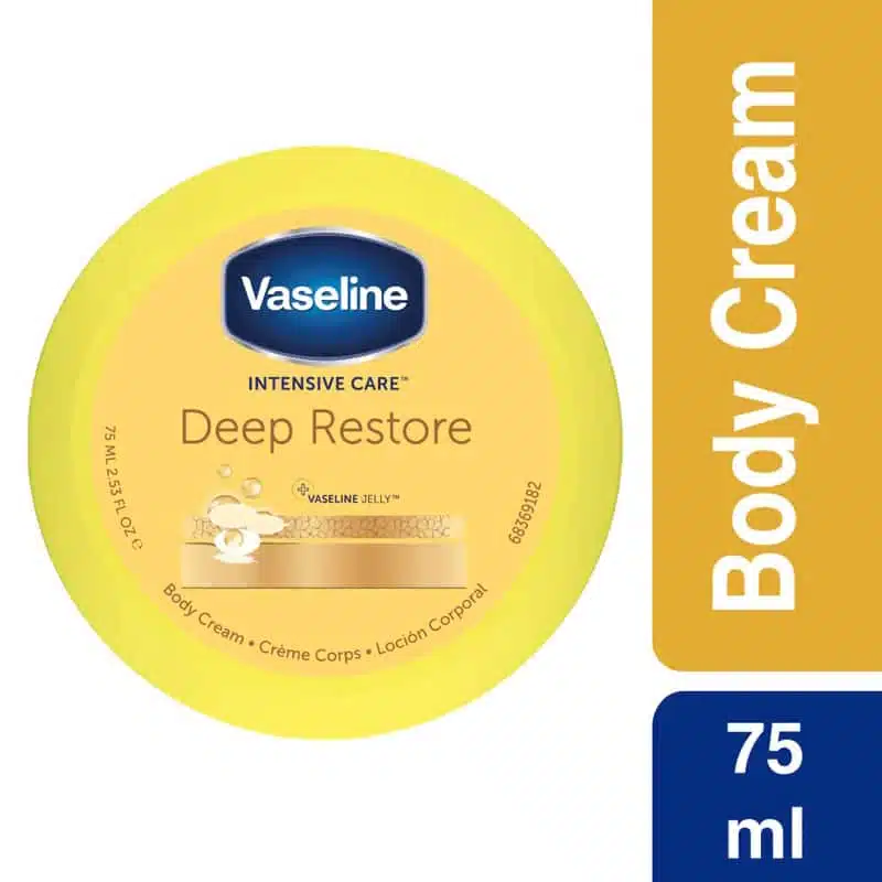 Front view of Vaseline Intensive Care Deep Restore Body Cream 75ml tube, blue cap, white body. - thumbnail