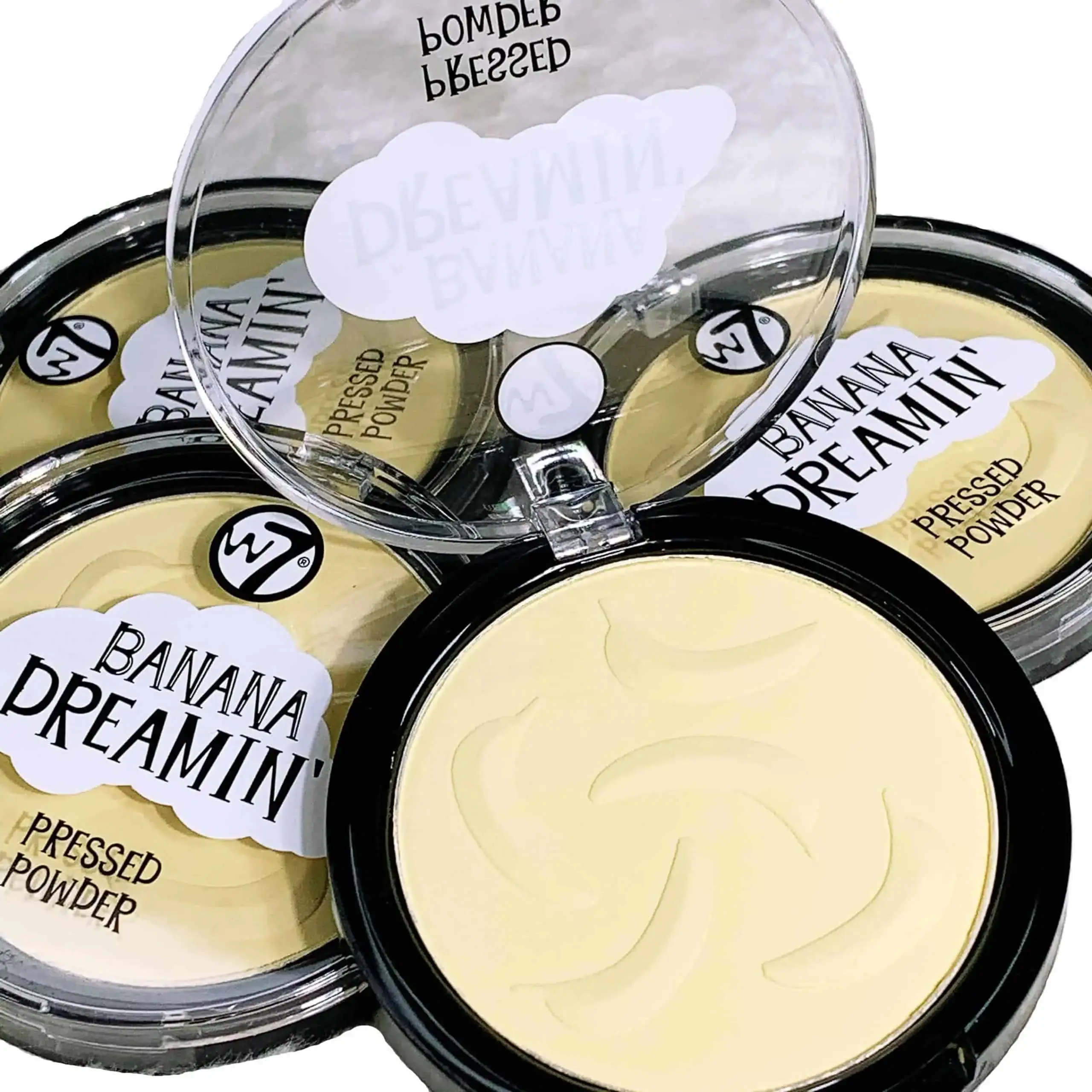 W7 Banana Dreamin pressed powder compact open, revealing light yellow powder and sponge applicator. - thumbnail